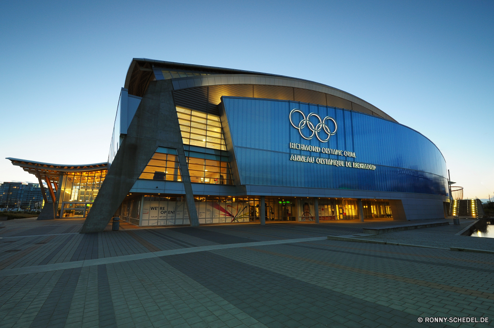 Richmond Olympic Oval Gebäude Architektur Struktur Himmel Stadt Anlage Urban Büro Hütte moderne Landschaft Obdach Kino Reisen aussenansicht Gebäude Glas Geschäft Museum Bau Theater Wolken Innenstadt Wolkenkratzer Turm Universität Depot Sonnenuntergang Haus Stadtansicht Fenster Szene Transport Planetarium Unternehmen Brücke im freien Fassade Straße Nacht Dämmerung Wasser groß Industrie Licht Windows Plakat Verkehr hoch Verkehr Park finanzielle Stahl Skyline Wolke Zentrum kommerzielle 'Nabend Platz Straße sportliche Anlage Industrielle Sommer Neu Berg Gras architektonische Schild Spiegel Bahnhof Finanzen Stadt Farbe Reflexion Turnhalle Dach Backstein Meer Landkreis Panorama Immobilien Tourismus Umgebung Tourist Metall Arbeit building architecture structure sky city facility urban office hut modern landscape shelter cinema travel exterior buildings glass business museum construction theater clouds downtown skyscraper tower university depository sunset house cityscape window scene transportation planetarium corporate bridge outdoors facade road night dusk water tall industry light windows billboard traffic high transport park financial steel skyline cloud center commercial evening place street athletic facility industrial summer new mountain grass architectural signboard mirror station finance town color reflection gymnasium roof brick sea district panoramic estate tourism environment tourist metal work