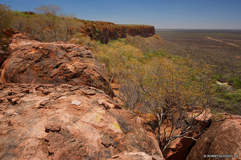 Waterberg Plateau Park Schlucht Landschaft Wüste Himmel Berg Tal Park Baum nationalen Berge Fels vascular plant Wildnis landschaftlich Schlucht Reisen Sand Pflanze Hügel trocken woody plant Strauch im freien im freien Aushöhlung Amaranth Wolken Stein Klippe Geologie Kraut Felsen Tourismus Südwesten Land Arid Urlaub Knoll Grand Sommer Wandern Abenteuer Herbst natürliche depression natürliche Szenerie Sandstein Hügel Westen Orange Entwicklung des ländlichen Panorama Pflanzen Sirup Kaktus fallen Sonnenuntergang Licht Fluss Land Bereich Belaubung Landschaft Umgebung Bäume Bildung sonnig Süden Steinmauer Feld Straße Wild Gras Wolke heiß Farbe Bereich Ökologie Wahrzeichen Wiese karge bunte Felge Wald Aussicht außerhalb Busch Schmutz bewölkt Erde Hochland Insel friedliche Zaun gelb ruhige Horizont Tag canyon landscape desert sky mountain valley park tree national mountains rock vascular plant wilderness scenic ravine travel sand plant hill dry woody plant shrub outdoors outdoor erosion amaranth clouds stone cliff geology herb rocks tourism southwest land arid vacation knoll grand summer hiking adventure autumn natural depression natural scenery sandstone hills west orange rural panorama plants syrup cactus fall sunset light river country area foliage countryside environment trees formation sunny south stone wall field road wild grass cloud hot color range ecology landmark meadow barren colorful rim forest vista outside bush dirt cloudy earth highland island peaceful fence yellow tranquil horizon day