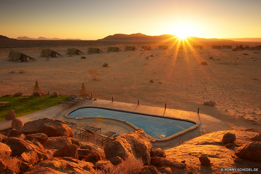 Namibia Sonne Sand Sonnenuntergang Landschaft Strand Himmel Sterne Sonnenaufgang Wüste Reisen Wolken Himmelskörper Dämmerung Meer Morgenröte Sommer Berg Boden Fels Horizont Wasser Ozean Orange Berge im freien Hochland Tourismus Stein landschaftlich Szenerie Erde im freien Wolke 'Nabend Baum Szene Urlaub Tal Küste Sonnenlicht natürliche Wetter Schlucht Saison Golden Ufer Park gelb Farbe Land Kontur Entwicklung des ländlichen Welle sonnig bunte Urlaub Tropischer Arid nationalen Abenteuer Aushöhlung heiß Landschaften Felsen Hügel Insel Feld am Morgen Gold Reflexion Bucht Sonnenschein Wellen Licht See Ruhe dunkel Umgebung Gelände Surf Bereich Gras außerhalb trocken friedliche Fluss Wiese Nacht Südwesten dramatische Tourist ruhige Klippe seelandschaft Geologie Küste Sonnenstrahl Dämmerung Wildnis Landschaften Wolkengebilde Klima Resort Pflanze Düne Küste warm Frühling Herbst niemand sun sand sunset landscape beach sky star sunrise desert travel clouds celestial body dusk sea dawn summer mountain soil rock horizon water ocean orange mountains outdoor highland tourism stone scenic scenery earth outdoors cloud evening tree scene vacation valley coast sunlight natural weather canyon season golden shore park yellow color land silhouette rural wave sunny colorful holiday tropical arid national adventure erosion hot landscapes rocks hill island field morning gold reflection bay sunshine waves light lake calm dark environment terrain surf area grass outside dry peaceful river meadow night southwest dramatic tourist tranquil cliff seascape geology coastal sunbeam twilight wilderness scenics cloudscape climate resort plant dune coastline warm spring autumn nobody