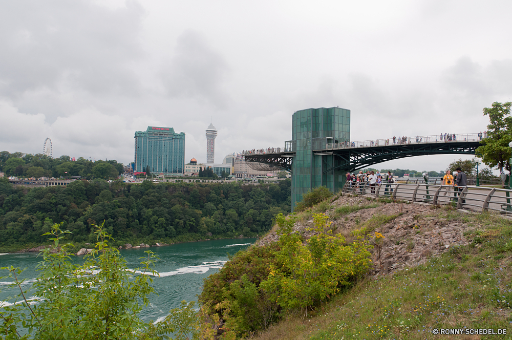 Niagara Falls Brücke Hängebrücke Struktur Stadt Skyline Architektur Gebäude Urban Fluss Stadtansicht Gebäude Reisen Kühlturm Himmel Wolkenkratzer Anlegestelle Innenstadt Gerät Landschaft Wasser Kühlsystem Turm Wahrzeichen Wolkenkratzer Unterstützung moderne Mechanismus Tourismus Büro Geschäft Reflexion landschaftlich Meer Stadt Szene Panorama Festung Wolken Hafen am Wasser Szenerie Landkreis Sonnenuntergang Bucht Bogenbrücke aus Stahl Wolke aussenansicht Boot Park Tag Sommer Küste Zentrum Urlaub Baum Haus Dämmerung bewölkt Bau Ozean Ufer Ziel alt Neu Bäume Hügel Tourist Licht Metropolitan hoch sonnig im freien Strand Küste Denkmal im freien berühmte Urlaub finanzielle Nacht Herbst Schloss bridge suspension bridge structure city skyline architecture building urban river cityscape buildings travel cooling tower sky skyscraper pier downtown device landscape water cooling system tower landmark skyscrapers support modern mechanism tourism office business reflection scenic sea town scene panorama fortress clouds harbor waterfront scenery district sunset bay steel arch bridge cloud exterior boat park day summer coast center vacation tree house dusk cloudy construction ocean shore destination old new trees hill tourist light metropolitan high sunny outdoor beach coastline monument outdoors famous holiday financial night autumn castle