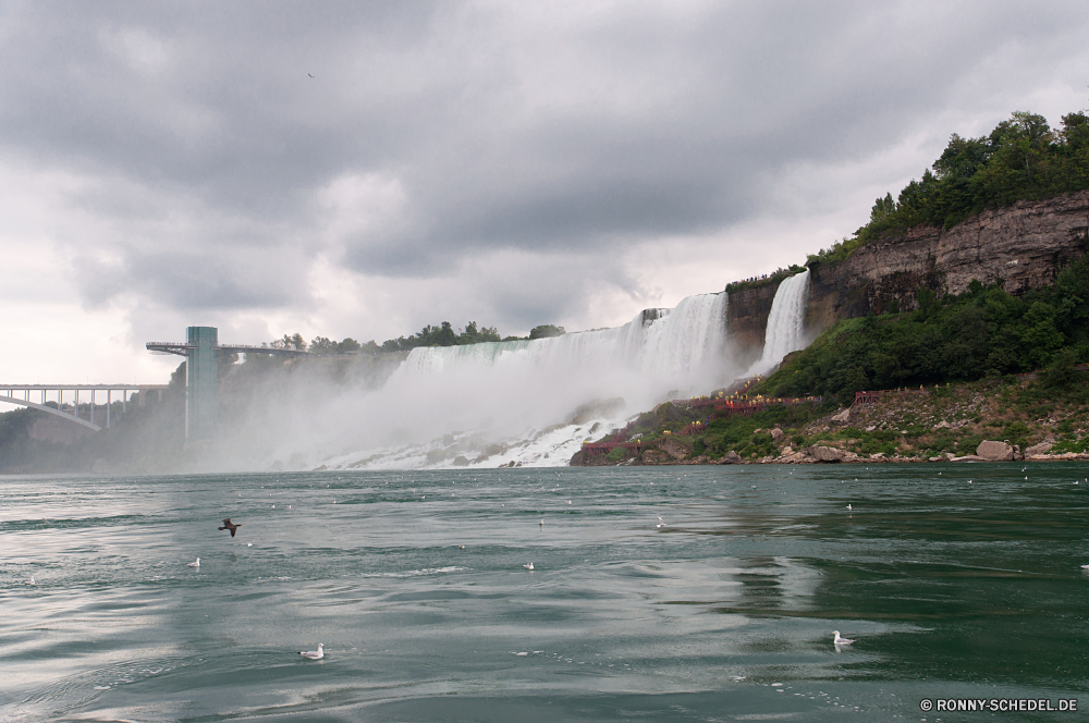 Niagara Falls Ozean Wasser Meer Strand Landschaft Küste Reisen Körper des Wassers Küstenlinie Küste Himmel Kanal Welle Fels Ufer Wellen Wolken Klippe Boot Sand Fluss Bucht Sommer landschaftlich Wolke Surf Tourismus Berg Urlaub Tropischer Barrier Eisberg seelandschaft geologische formation Insel im freien Felsen Vorgebirge Wetter Wasserfall Szenerie Stein am Meer Szene Obstruktion Baum im freien Sonne natürliche Höhe Horizont Schiff Urlaub Wellenbrecher See natürliche Feuerlöschboot Küste Tourist macht Dam fällt Reflexion Wald Paradies friedliche ruhige Struktur Sonnenuntergang Pazifik Sturm Landschaften Hügel Saison Entspannung Frieden Wahrzeichen Kap Stream kalt sonnig Schiff bewölkt platsch Farbe Berge Erholung Licht Sonnenlicht Inseln Schnellboot dramatische gischt Eis Entspannen Sie sich idyllische Umgebung Ruhe entspannende Handwerk ocean water sea beach landscape coast travel body of water shoreline coastline sky channel wave rock shore waves clouds cliff boat sand river bay summer scenic cloud surf tourism mountain vacation tropical barrier iceberg seascape geological formation island outdoor rocks promontory weather waterfall scenery stone seaside scene obstruction tree outdoors sun natural elevation horizon vessel holiday breakwater lake natural fireboat coastal tourist power dam falls reflection forest paradise peaceful tranquil structure sunset pacific storm scenics hill season relaxation peace landmark cape stream cold sunny ship cloudy splash color mountains recreation light sunlight islands speedboat dramatic spray ice relax idyllic environment calm relaxing craft