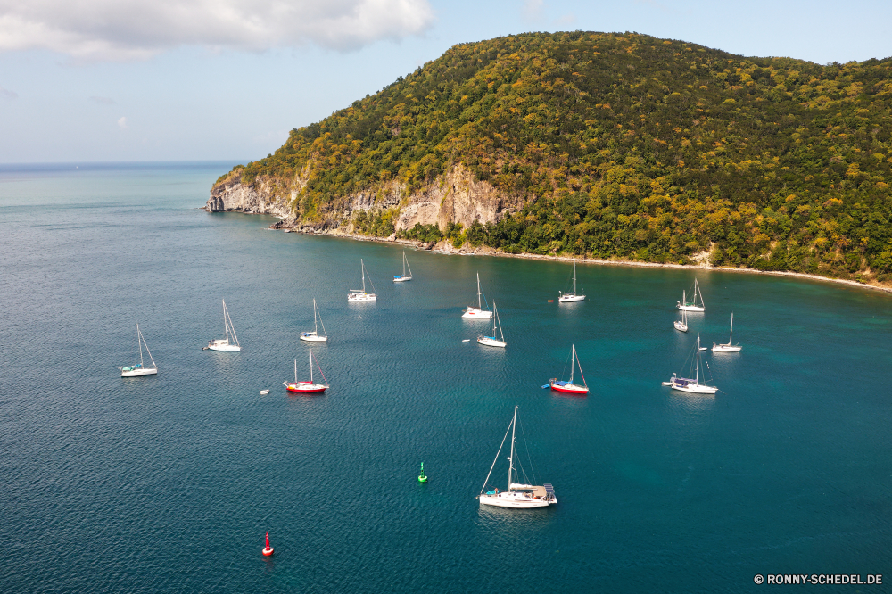 Guadeloupe Vorgebirge Meer Ozean Kap natürliche Höhe Wasser Strand Küste geologische formation Landschaft Insel Ufer Bucht Küste Berg Reisen Urlaub Himmel Fels landschaftlich Hügel Klippe Sommer Tourismus Küstenlinie Sonne Baum Wolken Wolke seelandschaft Horizont Urlaub Tropischer am Meer Küste Stein Sand Welle Inseln Schiff Felsen Wellen Berge sonnig Wetter Szenerie Hafen Szene See Tag ruhige Pazifik Wald Boot im freien felsigen Paradies Boote am See Entspannen Sie sich friedliche Wahrzeichen Sonnenuntergang Jacht Dorf Architektur Ziel Stadt Stadt nationalen Tourist Bäume Insel Riff Luftbild Hafen idyllische Entspannung Süden im freien Ruhe promontory sea ocean cape natural elevation water beach coast geological formation landscape island shore bay coastline mountain travel vacation sky rock scenic hill cliff summer tourism shoreline sun tree clouds cloud seascape horizon holiday tropical seaside coastal stone sand wave islands ship rocks waves mountains sunny weather scenery harbor scene lake day tranquil pacific forest boat outdoor rocky paradise boats lakeside relax peaceful landmark sunset yacht village architecture destination town city national tourist trees isle reef aerial port idyllic relaxation south outdoors calm