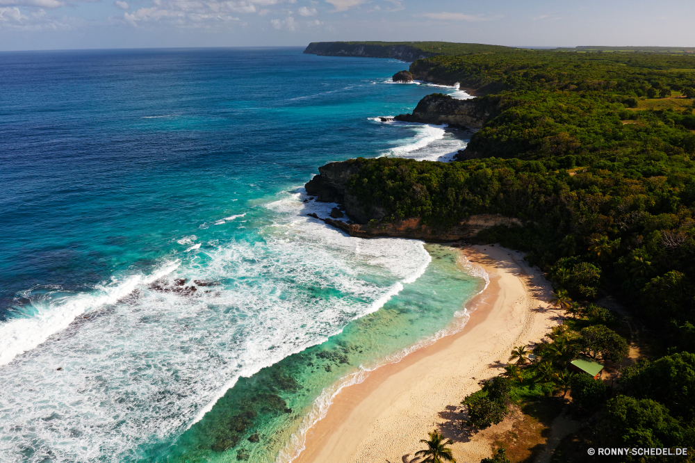 Guadeloupe Strand Ozean Meer Küste Sand Wasser Urlaub Landschaft Insel am Meer Himmel Reisen Paradies Ufer Wellen landschaftlich Küste Küstenlinie Bucht Sonne Sommer Urlaub Tropischer Fels Welle Tourismus sonnig Baum seelandschaft Felsen Ziel Wolke warm Erholung Klippe Tourist im freien Wolken natürliche Höhe Szenerie Surf Körper des Wassers Vorgebirge Kap Palm klar Szene Stein felsigen Entspannen Sie sich Küste ruhige Horizont Boot exotische geologische formation Berg Sandbank Pazifik natürliche Panorama Resort Inseln Lagune Türkis Park Traum Entspannung romantische idyllische entspannende Barrier Bar Urlaub friedliche heiß Stadt Meeresküste im freien Hügel Urlaub Ruhe Freizeit Riff Schwimmen Bewuchs Schwimmen Reise Land Grat Bäume Klippen sandigen Wendekreis Marine Süden Wetter beach ocean sea coast sand water vacation landscape island seaside sky travel paradise shore waves scenic coastline shoreline bay sun summer holiday tropical rock wave tourism sunny tree seascape rocks destination cloud warm recreation cliff tourist outdoor clouds natural elevation scenery surf body of water promontory cape palm clear scene stone rocky relax coastal tranquil horizon boat exotic geological formation mountain sandbar pacific natural panorama resort islands lagoon turquoise park dream relaxation romantic idyllic relaxing barrier bar vacations peaceful hot city seashore outdoors hill holidays calm leisure reef swim vegetation swimming trip land ridge trees cliffs sandy tropic marine south weather