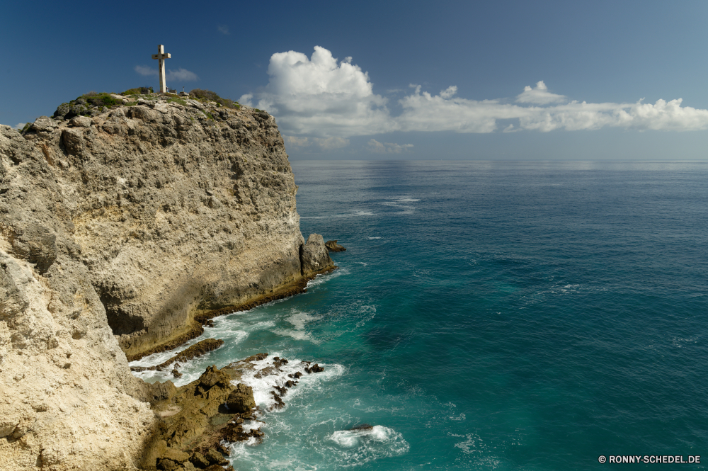 Guadeloupe Klippe geologische formation Meer Ozean Vorgebirge Küste natürliche Höhe Wasser Strand Fels Landschaft Ufer Reisen Festung Küste Himmel Urlaub Insel Bucht Tourismus Sommer seelandschaft Felsen Stein Welle Wellen Sand landschaftlich am Meer Küste Sonne Horizont Wolken Urlaub Tropischer Berg felsigen Surf Szenerie Szene Kap Küstenlinie Pazifik im freien im freien Hügel friedliche ruhige Paradies Süden Resort Licht Klippen Türkis Umgebung Steine Struktur Wahrzeichen Baum Sonnenlicht sonnig Wolke Wetter Turm Tag natürliche Ziel Wellenbrecher Leuchtturm Barrier Landschaften Entspannen Sie sich Stadt Tourist Gras Gezeiten Lagune Meeresküste Sturm England Urlaub Sonnenaufgang Stadt Berge Ruhe Farbe Sonnenuntergang cliff geological formation sea ocean promontory coast natural elevation water beach rock landscape shore travel fortress coastline sky vacation island bay tourism summer seascape rocks stone wave waves sand scenic seaside coastal sun horizon clouds holiday tropical mountain rocky surf scenery scene cape shoreline pacific outdoor outdoors hill peaceful tranquil paradise south resort light cliffs turquoise environment stones structure landmark tree sunlight sunny cloud weather tower day natural destination breakwater lighthouse barrier scenics relax city tourist grass tide lagoon seashore storm england vacations sunrise town mountains calm color sunset