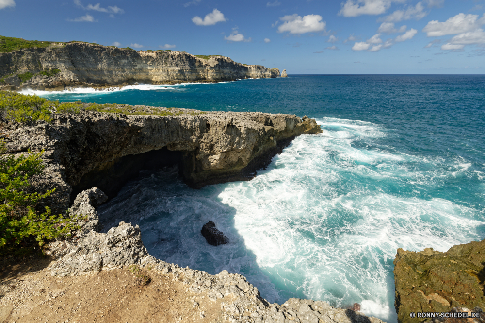 Guadeloupe Ozean Strand Meer Küste Küstenlinie Landschaft Wasser Küste Ufer Wellenbrecher Himmel Fels Sand Reisen Welle Barrier Urlaub Sommer Insel Stein Körper des Wassers Wellen Bucht landschaftlich Klippe am Meer Obstruktion Sonne Tourismus Felsen Urlaub Wolken felsigen Surf Horizont seelandschaft Szenerie Vorgebirge Struktur im freien sonnig Wolke im freien Tropischer Kap natürliche Höhe Szene Paradies Sonnenuntergang geologische formation Ziel Tourist Entspannen Sie sich Gezeiten ruhige Pazifik friedliche Berg Sonnenlicht Steine Wind Wetter Erholung Küste Panorama idyllische Urlaub Tag Baum Stadt Klippen Meeresküste Türkis klar Landschaften Urlaub Resort Freizeit Schaum Entspannung warm Ruhe natürliche Kante Sturm Stadt ocean beach sea coast shoreline landscape water coastline shore breakwater sky rock sand travel wave barrier vacation summer island stone body of water waves bay scenic cliff seaside obstruction sun tourism rocks holiday clouds rocky surf horizon seascape scenery promontory structure outdoor sunny cloud outdoors tropical cape natural elevation scene paradise sunset geological formation destination tourist relax tide tranquil pacific peaceful mountain sunlight stones wind weather recreation coastal panorama idyllic holidays day tree city cliffs seashore turquoise clear scenics vacations resort leisure foam relaxation warm calm natural edge storm town