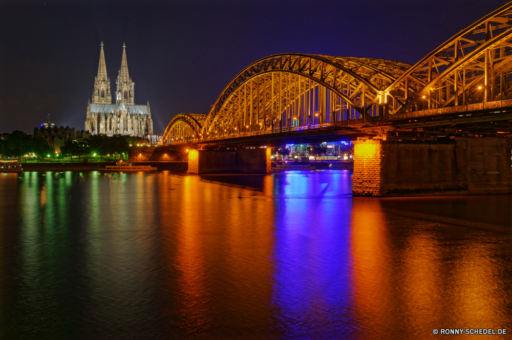 Kölner Dom und Hohenzollernbrücke Bogenbrücke aus Stahl Brücke Struktur Fluss Nacht Stadt Architektur Stadtansicht Wasser Skyline Reisen Urban Tourismus Wahrzeichen Gebäude Himmel Turm Reflexion Anlegestelle Gebäude 'Nabend berühmte Landschaft Dämmerung Lichter Licht Innenstadt Szene Hafen Bucht moderne Stadt Tourist Wolkenkratzer Sonnenuntergang dunkel Unterstützung Hauptstadt England beleuchtete Bau am Wasser Boot Geschäft Transport Meer Panorama Dämmerung Stahl Urlaub Hafen Attraktion Wolken Gerät Straße Reflexionen landschaftlich Denkmal Straße historischen Küste Geschichte Büro Metropole Wolkenkratzer Vereinigte Verkehr groß alt Bogen hoch Boote Zentrum Ozean Platz Zeit bunte Sommer steel arch bridge bridge structure river night city architecture cityscape water skyline travel urban tourism landmark building sky tower reflection pier buildings evening famous landscape dusk lights light downtown scene harbor bay modern town tourist skyscraper sunset dark support capital england illuminated construction waterfront boat business transportation sea panorama twilight steel holiday port attraction clouds device road reflections scenic monument street historic coast history office metropolis skyscrapers united traffic tall old arch high boats center ocean place time colorful summer