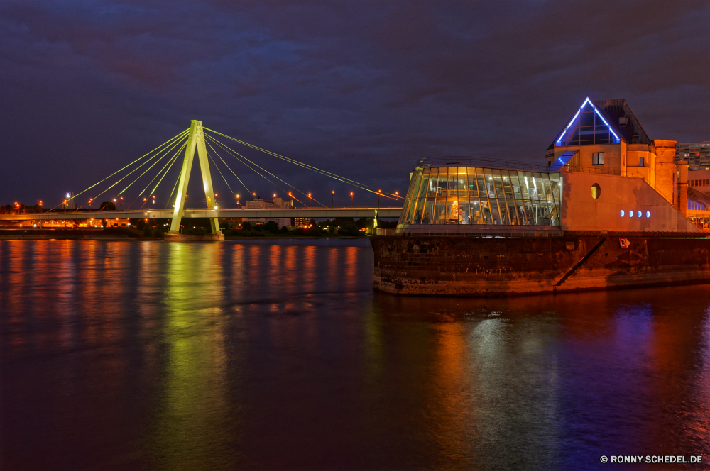 Severinsbrücke und Schokoladenmuseum Anlegestelle Brücke Unterstützung Gerät Struktur Wasser Stadt Wahrzeichen Architektur Hängebrücke Fluss Nacht Reisen Schiff Himmel Transport Containerschiff Ozean Bucht Tourismus Meer Dämmerung Aufhängung berühmte Stadtansicht Sonnenuntergang Gebäude Urban Frachtschiff Hafen am Wasser 'Nabend Schiff Verkehr Verkehr Skyline Turm Tor Tourist Reflexion Landschaft historischen Golden Straße Attraktion Szene Hafen Kabel Versand Industrie Ingenieurwesen Stahl Kran Dock Pazifik Innenstadt Geschäft moderne Gebäude Boot Industrielle Fracht landschaftlich Lichter Container Wolken Export Küste Bau Licht Neu hoch groß Urlaub Fracht Kabel Wolkenkratzer Dämmerung Boote Handel Eisen Straße Metropolitan Autobahn Wolkenkratzer Orange Sonnenaufgang Denkmal Osten Handel dunkel im freien Metall Landzungen Import Krane Logistik internationalen historische Ufer Stadt Verbindung nationalen Horizont Tag pier bridge support device structure water city landmark architecture suspension bridge river night travel ship sky transportation container ship ocean bay tourism sea dusk suspension famous cityscape sunset building urban cargo ship harbor waterfront evening vessel transport traffic skyline tower gate tourist reflection landscape historic golden road attraction scene port cable shipping industry engineering steel crane dock pacific downtown business modern buildings boat industrial cargo scenic lights container clouds export coast construction light new high tall vacation freight cables skyscrapers twilight boats trade iron street metropolitan highway skyscraper orange sunrise monument east commerce dark outdoors metal headlands import cranes logistics international historical shore town connection national horizon day