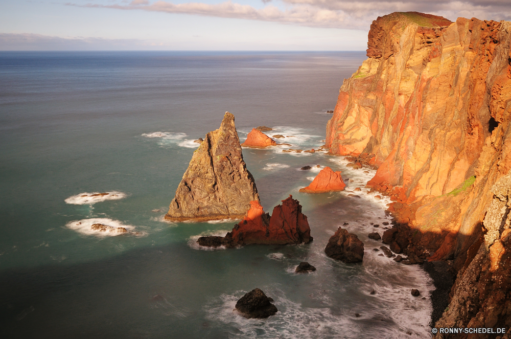 Ponta de Sao Lourenco Klippe Ozean geologische formation Strand Meer Küste Landschaft Sand Fels Wasser Küste Himmel Reisen Ufer Welle Tourismus Urlaub Felsen Sommer Wellen Bucht Insel Sonne seelandschaft Körper des Wassers Stein Sonnenuntergang Wolken landschaftlich felsigen Küstenlinie Horizont Urlaub Küste Surf im freien Szenerie am Meer Klippen Szene Gezeiten Wolke im freien Vorgebirge Sonnenaufgang natürliche Sturm Boden Berg Schiff Türkis natürliche Höhe Süden Umgebung Erde Tourist Wetter Wahrzeichen Resort Ziel friedliche Reflexion Apostel Sonnenlicht Bildung Tropischer Paradies Wind Boot Farbe Berge zwölf klar Aushöhlung sonnig Morgenröte Pazifik in der Nähe Baum Panorama bewölkt Kontur Licht ruhige Tag cliff ocean geological formation beach sea coast landscape sand rock water coastline sky travel shore wave tourism vacation rocks summer waves bay island sun seascape body of water stone sunset clouds scenic rocky shoreline horizon holiday coastal surf outdoors scenery seaside cliffs scene tide cloud outdoor promontory sunrise natural storm soil mountain ship turquoise natural elevation south environment earth tourist weather landmark resort destination peaceful reflection apostles sunlight formation tropical paradise wind boat color mountains twelve clear erosion sunny dawn pacific near tree panorama cloudy silhouette light tranquil day