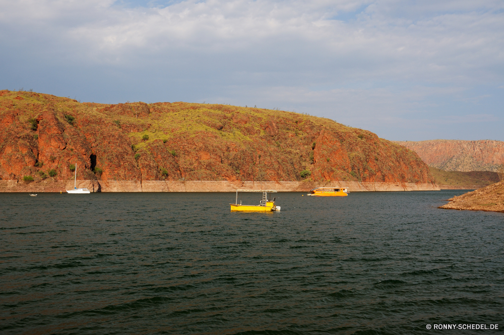 Lake Argyle Wasser Landschaft Meer Ozean Vorgebirge Klippe geologische formation Küste Insel Berg Ufer natürliche Höhe Himmel Reisen Boot Fluss Strand landschaftlich Fels Bucht Tourismus Urlaub Schiff Sommer See Tragflügelboot Küste am See Berge Szenerie Schiff Felsen Gerät Baum Wolken Sand Containerschiff Hügel Sonne friedliche ruhige Urlaub Bäume Reflexion sonnig Inseln Tropischer Tourist Stein Frachtschiff Kap im freien Boote seelandschaft Wald Szene Wellen Hügel felsigen Hafen Ziel Wolke Tag Haus im freien Dorf am Meer Welle Stadt Versand natürliche Stadt Horizont Park Segel Entwicklung des ländlichen Gebäude Häuser Entspannen Sie sich Entspannung Ruhe Wahrzeichen Farbe Förde Körper des Wassers Pazifik Kanal in der Nähe Angeln Architektur idyllische Paradies Urlaub Dam Brücke Insel Struktur hoch Kreuzfahrt Nautik Steine Resort Barrier nationalen water landscape sea ocean promontory cliff geological formation coast island mountain shore natural elevation sky travel boat river beach scenic rock bay tourism vacation ship summer lake hydrofoil coastline lakeside mountains scenery vessel rocks device tree clouds sand container ship hill sun peaceful tranquil holiday trees reflection sunny islands tropical tourist stone cargo ship cape outdoors boats seascape forest scene waves hills rocky harbor destination cloud day house outdoor village seaside wave town shipping natural city horizon park sail rural building houses relax relaxation calm landmark color fjord body of water pacific channel near fishing architecture idyllic paradise holidays dam bridge isle structure high cruise nautical stones resort barrier national