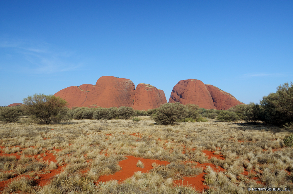 Ayers Rock und The Olgas Knoll Wüste Landschaft Schlucht Fels Himmel Reisen Berg Park Sand nationalen Tal landschaftlich Stein Sandstein Tourismus Klippe Südwesten Berge im freien Wildnis Szenerie Aushöhlung Backstein im freien Felsen trocken Hügel Wolken Orange natürliche Urlaub Baum Arid Westen Baumaterial Denkmal sonnig Bildung Geologie Abenteuer Formationen geologische Grand Wahrzeichen Sommer Sonnenuntergang Butte Mesa Wandern Sonne Schlucht Wolke Entwicklung des ländlichen gelb Land Horizont Bögen Tag Pflanze Aussicht Hügel westliche Darm-Trakt Bereich Sonnenaufgang Feld Landschaft Hochland Umgebung Straße Hügel Land Reise Tourist Wasser Gras bunte Verwurzelung Wunder Szene Gelände Spitze Bewuchs Landschaften Panorama Reise Boden friedliche Düne knoll desert landscape canyon rock sky travel mountain park sand national valley scenic stone sandstone tourism cliff southwest mountains outdoors wilderness scenery erosion brick outdoor rocks dry hill clouds orange natural vacation tree arid west building material monument sunny formation geology adventure formations geological grand landmark summer sunset butte mesa hiking sun ravine cloud rural yellow land horizon arches day plant vista hills western tract area sunrise field countryside highland environment road mound country journey tourist water grass colorful desolate wonder scene terrain peak vegetation scenics panorama trip soil peaceful dune