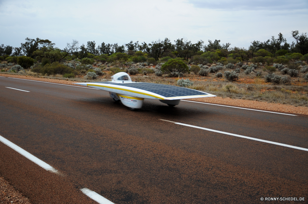 Solar race - unleaded wins Auto Straße Kfz Cabrio Autobahn Asphalt Verkleidungsscheibe Laufwerk Transport Reisen Racer Tragfläche Geschwindigkeit Landschaft Himmel Straße Gerät Verkehr fahren Verkehr Flughafen schnell Berg Radfahrzeug Wolken Fahrzeug Bewegung Auto Reise Reise Linie Entwicklung des ländlichen Auto Horizont leere Autobahn Art und Weise Strecke Bewegung Hügel Spur Rennen Flugplatz Wolke Verschieben Richtung Wüste Berge Land Gras Szenerie landschaftlich Perspektive im freien Sommer bewölkt Freiheit Fahrbahn Urlaub Kreuzung Rad Ziel Weichzeichnen Asphalt voran Sport Kurve niemand Landschaft Anlage Autobahn Rennsport im freien Motor Szene Tag Licht macht Baum Sicherheit Coupé Ozean Sand Autos gerade Land Motor gelb Sportwagen lange Umgebung Wetter Wald Räder hoch sonnig einsam Flugzeug Feld Park Sport Biegung Reifen Flugzeug Speedway Meer car road motor vehicle convertible highway asphalt spoiler drive transportation travel racer airfoil speed landscape sky street device transport driving traffic airport fast mountain wheeled vehicle clouds vehicle motion auto trip journey line rural automobile horizon empty freeway way route movement hill lane race airfield cloud moving direction desert mountains land grass scenery scenic perspective outdoor summer cloudy freedom roadway vacation intersection wheel destination blur tarmac ahead sport curve nobody countryside facility motorway racing outdoors engine scene day light power tree safety coupe ocean sand cars straight country motor yellow sports car long environment weather forest wheels high sunny lonely airplane field park sports bend tire aircraft speedway sea