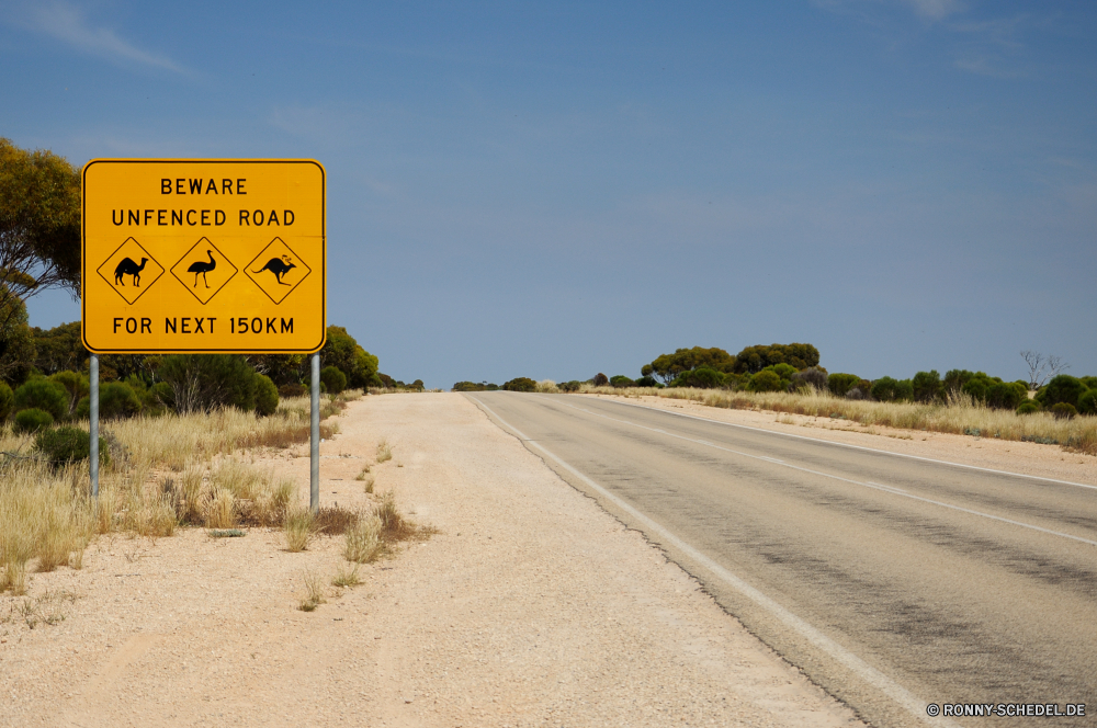 Australien in zwei Schildern erklärt Schnellstraße Landschaft Straße Himmel Wolken Entwicklung des ländlichen Horizont Wolke Feld Autobahn Reisen Kreuzung Asphalt Land Gras Sommer Wiese Land Baum Laufwerk Sand Szene Reise Art und Weise landschaftlich Szenerie im freien Wüste Landschaft sonnig Reise Bauernhof Wetter im freien bewölkt leere Reiner Landwirtschaft Umgebung Geschwindigkeit Wasser Autobahn Verkehr Strand Transport Wolkengebilde Meer Saison Wald Urlaub Boden natürliche Öffnen Richtung idyllische Sonne Berge Linie Pflanze Frühling Strecke fahren Tourismus Verkehr Ozean gelb Perspektive Hügel trocken Straße friedliche Freiheit Farbe Küste Felder Breite Landbau Ziel ruhige Weizen Urlaub Bäume Berg voran An gerade einsam bunte Bewegung außerhalb Ernte Biegung klar Ackerland Tropischer Fahrzeug Klima Küste Zeichen Süden Wind Linien hell Heu Steppe expressway landscape road sky clouds rural horizon cloud field highway travel intersection asphalt land grass summer meadow country tree drive sand scene journey way scenic scenery outdoors desert countryside sunny trip farm weather outdoor cloudy empty plain agriculture environment speed water freeway transport beach transportation cloudscape sea season forest holiday ground natural open direction idyllic sun mountains line plant spring route driving tourism traffic ocean yellow perspective hill dry street peaceful freedom color coast fields wide farming destination tranquil wheat vacation trees mountain ahead to straight lonely colorful motion outside harvest bend clear farmland tropical vehicle climate coastline sign south wind lines bright hay steppe