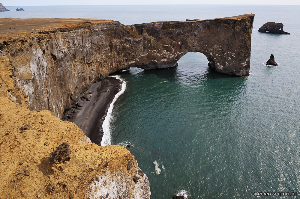 Dyrholaey Dam Barrier Obstruktion Küste Meer Ozean Landschaft Wasser Fels Klippe Kanal Küste Reisen Strand Struktur Körper des Wassers geologische formation Himmel Stein Felsen Ufer Berg landschaftlich Insel Urlaub Sommer Sand Welle Urlaub Tourismus Szenerie Bucht im freien Sonne Fluss Wellen im freien felsigen Wolken seelandschaft Höhle Horizont Küstenlinie Berge Szene See Klippen Wolke am Meer Küste friedliche Tourist Surf Tag Sonnenlicht Landschaften Reflexion Steine Wald Hügel Resort sonnig Tropischer Entspannen Sie sich ruhige Ziel natürliche Sonnenuntergang Park Umgebung natürliche depression Panorama Sonnenaufgang Boot Baum Ruhe Kante Saison Brücke Paradies Sonnenschein Schlucht Vorgebirge Wetter Licht Bäume Wildnis Wellenbrecher Meeresküste Farbe Stream Reiseziele Entspannung Urlaub Frühling dam barrier obstruction coast sea ocean landscape water rock cliff channel coastline travel beach structure body of water geological formation sky stone rocks shore mountain scenic island vacation summer sand wave holiday tourism scenery bay outdoors sun river waves outdoor rocky clouds seascape cave horizon shoreline mountains scene lake cliffs cloud seaside coastal peaceful tourist surf day sunlight scenics reflection stones forest hill resort sunny tropical relax tranquil destination natural sunset park environment natural depression panorama sunrise boat tree calm edge season bridge paradise sunshine canyon promontory weather light trees wilderness breakwater seashore color stream destinations relaxation vacations spring