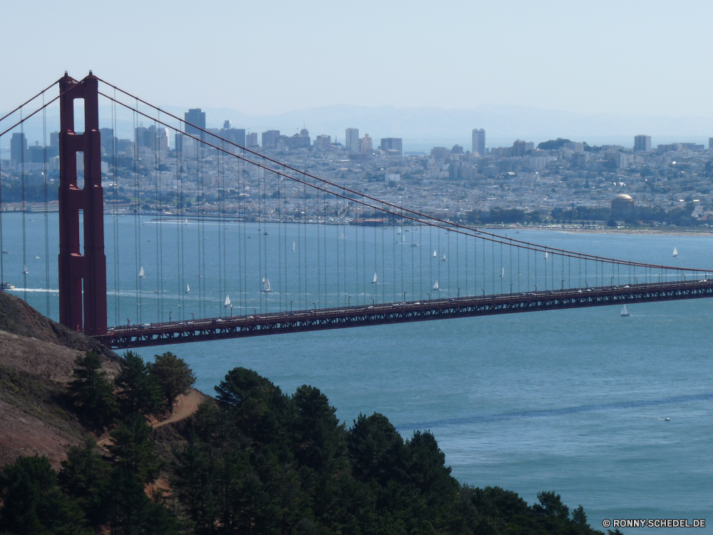 Golden Gate Bridge Hängebrücke Brücke Struktur Anlegestelle Wahrzeichen Architektur Stadt Unterstützung Reisen Himmel Fluss Wasser Bucht Aufhängung Transport Ozean Tor Gerät Tourismus berühmte Meer Skyline Landschaft Urban Turm Kabel Pazifik Nacht Stadtansicht historischen Golden Gebäude Straße Küste 'Nabend Denkmal Kabel Szene Tourist Dämmerung Verkehr Sonnenuntergang Innenstadt landschaftlich Gebäude Tag Attraktion Ingenieurwesen Landzungen Bau Verbindung Stahl Urlaub Neu Osten Ufer Verkehr Autobahn Metall Wolke Lichter Span Hafen nationalen groß historische Wolken Straße moderne Reflexion Golden Gate Brücke beleuchtete Küste Orange Hügel Eisen Boot Sommer im freien Horizont Kreuzung Antike Reiseziele Wolkenkratzer im freien Platz Stadt Licht Szenerie Berg suspension bridge bridge structure pier landmark architecture city support travel sky river water bay suspension transportation ocean gate device tourism famous sea skyline landscape urban tower cable pacific night cityscape historic golden building road coast evening monument cables scene tourist dusk traffic sunset downtown scenic buildings day attraction engineering headlands construction connection steel vacation new east shore transport highway metal cloud lights span harbor national tall historical clouds street modern reflection golden gate bridge illuminated coastline orange hill iron boat summer outdoors horizon crossing ancient destinations skyscraper outdoor place town light scenery mountain