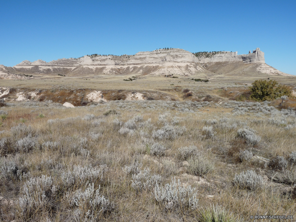 Scottsbluff National Monument Steppe Reiner Land Landschaft Berg Wüste Berge Himmel Fels Reisen Park nationalen Hügel Wildnis Bereich landschaftlich Stein Hochland Schlucht Tourismus Tal trocken Sand Baum Wolken Geologie im freien Umgebung Spitze Szenerie im freien Sommer Felsen Arid Wolke Sandstein Bereich niemand Landschaft natürliche Klippe Braun Gelände Hügel Schnee Fluss Entwicklung des ländlichen sonnig Gras Aushöhlung Landschaften Wild Wald Tag Wärme Kaktus heiß Feld Dürre Urlaub Extreme Panorama Abenteuer Düne Reise Insel Horizont Vulkan Bildung reservieren Szene gelb außerhalb Pflanze Farbe Straße Sonnenlicht Land karge felsigen Westen Klima Steine horizontale Wasser Strauch Wiese Boden steppe plain land landscape mountain desert mountains sky rock travel park national hill wilderness range scenic stone highland canyon tourism valley dry sand tree clouds geology outdoors environment peak scenery outdoor summer rocks arid cloud sandstone area nobody countryside natural cliff brown terrain hills snow river rural sunny grass erosion scenics wild forest day heat cactus hot field drought vacation extreme panorama adventure dune journey island horizon volcano formation reserve scene yellow outside plant color road sunlight country barren rocky west climate stones horizontal water shrub meadow ground