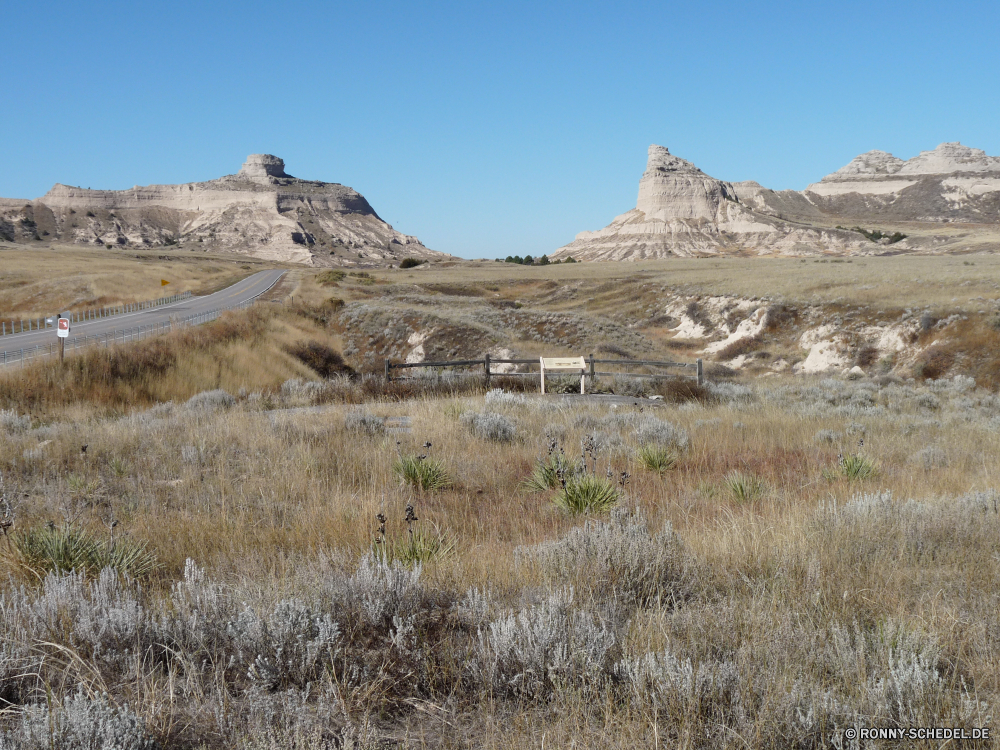 Scottsbluff National Monument Berg Landschaft Berge Hochland Himmel Bereich Fels Reisen Wüste Spitze Park Tal Wildnis nationalen Schlucht Land Stein Steppe Hügel Tourismus Felsen Reiner Schnee im freien landschaftlich Umgebung Wolken im freien Klippe Aufstieg Geologie felsigen Sommer Szenerie Baum Steigung Urlaub Landschaft Panorama Wald natürliche Gras Sand sonnig Landschaften Abenteuer Wolke Sandstein Gelände Fluss Bäume Hügel Tourist Wild trocken Ruhe Kaktus Wahrzeichen Bildung hoch Reise Entwicklung des ländlichen Arid Aushöhlung reservieren Wasser Wandern Tag Urlaub Bereich niemand Urlaub Alp Strauch Braun Herbst Schlucht Alpen Winter Steine Feld Bighorn Wärme Licht geologische formation See friedliche Straße klar mountain landscape mountains highland sky range rock travel desert peak park valley wilderness national canyon land stone steppe hill tourism rocks plain snow outdoors scenic environment clouds outdoor cliff ascent geology rocky summer scenery tree slope vacation countryside panorama forest natural grass sand sunny scenics adventure cloud sandstone terrain river trees hills tourist wild dry calm cactus landmark formation high journey rural arid erosion reserve water hiking day holiday area nobody vacations alp shrub brown autumn ravine alps winter stones field bighorn heat light geological formation lake peaceful road clear