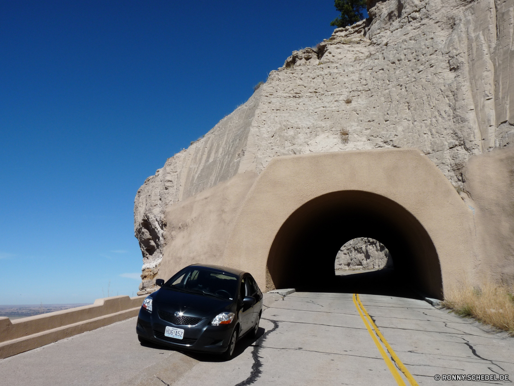 Scottsbluff National Monument Stein Antike Architektur Reisen Geschichte Grab Landschaft Tourismus alt Mauer Himmel Fassade Fels Berg Wüste Gebäude Tunnel Hövel Tourist Pyramide Denkmal im freien Sand Ruine Steine historischen Ruine berühmte Bogen Archäologie Wahrzeichen Durchgang Struktur Durchgang Urlaub Pharao Steigung Turm Vergangenheit Felsen historische Hügel Osten Kultur Aufstieg Haus Mitte Bau Wolken im freien Grab Sonne Dach Schnee Stadt Kirche Schloss Festung landschaftlich Antik groß Park aussenansicht nationalen Tempel Schrein Tag Kunst Landschaften Tür Ziel Platz Berge Straße Straße Religion Urlaub Sommer stone ancient architecture travel history grave landscape tourism old wall sky facade rock mountain desert building tunnel hovel tourist pyramid monument outdoors sand ruins stones historic ruin famous arch archeology landmark passageway structure passage vacation pharaoh slope tower past rocks historical hill east culture ascent house middle construction clouds outdoor tomb sun roof snow town church castle fortress scenic antique great park exterior national temple shrine day art scenics door destination place mountains street road religion holiday summer