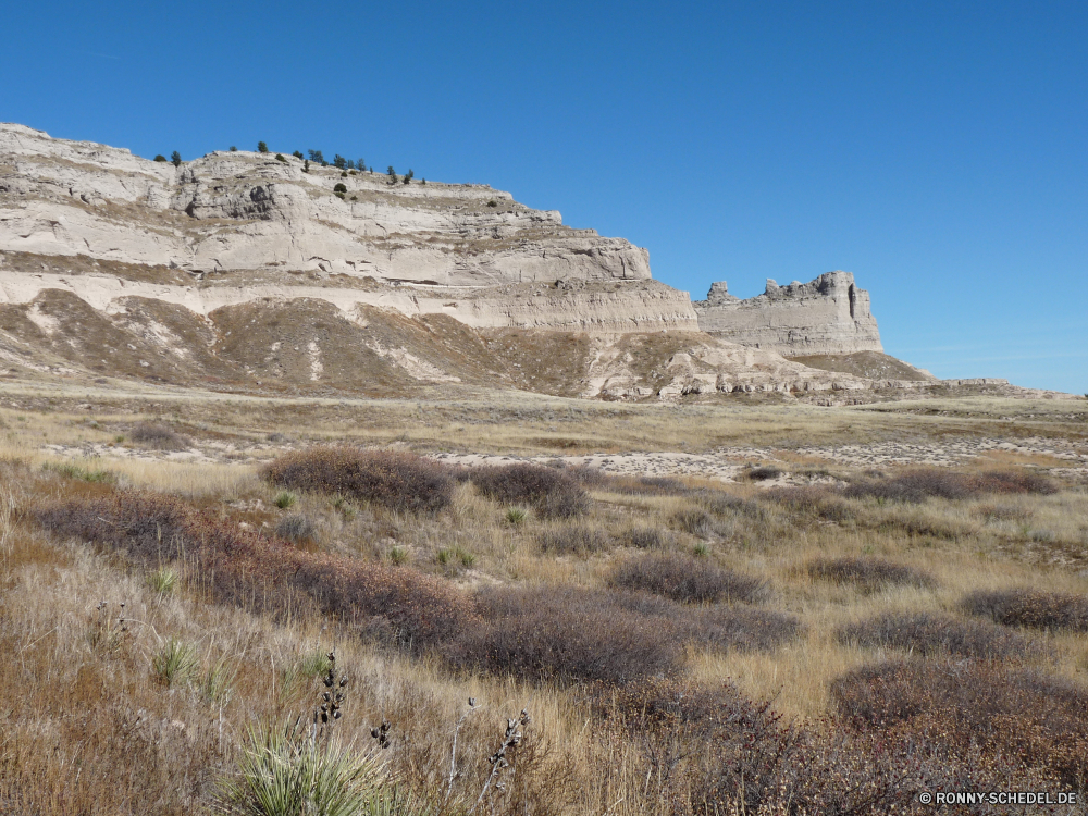 Scottsbluff National Monument Grab Landschaft Berg Fels Wüste Reisen Himmel Stein Knoll Aufstieg Steigung Tourismus Hügel Hochland Berge Park Klippe Antike Schlucht nationalen landschaftlich Felsen Geschichte Sand im freien Wildnis Tal Tourist im freien Spitze Bereich Umgebung Sommer Land Geologie Architektur Urlaub Ziel Wahrzeichen Bildung alt Szenerie Sandstein natürliche Panorama Abenteuer Steine Reise trocken Wolken Wanderung Kaktus Ruine felsigen Sonne Denkmal historischen Fluss Grat Archäologie Entwicklung des ländlichen Arid Aushöhlung Wild Pflanze Mauer Straße Ringwall bunte Tag hoch Ruine Gelände Wolke Erbe außerhalb Wandern in der Nähe Festung Bereich Reise Süden Osten Wasser Insel Sonnenuntergang Pyramide Land Schloss grave landscape mountain rock desert travel sky stone knoll ascent slope tourism hill highland mountains park cliff ancient canyon national scenic rocks history sand outdoors wilderness valley tourist outdoor peak range environment summer land geology architecture vacation destination landmark formation old scenery sandstone natural panorama adventure stones journey dry clouds hike cactus ruin rocky sun monument historic river ridge archeology rural arid erosion wild plant wall road rampart colorful day high ruins terrain cloud heritage outside hiking near fortress area trip south east water island sunset pyramid country castle