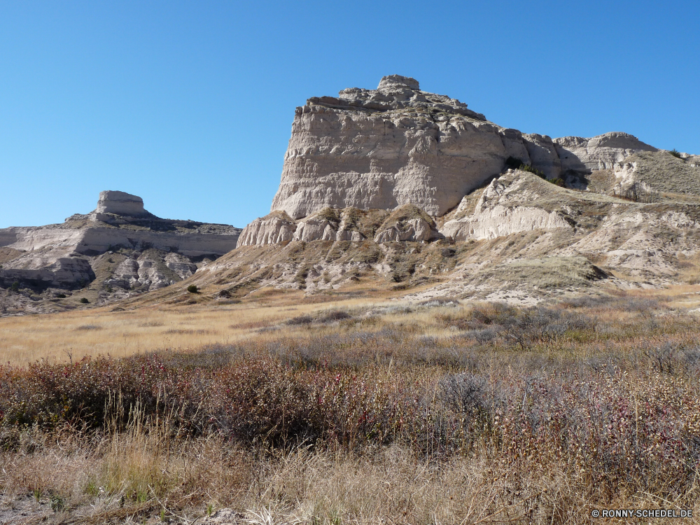 Scottsbluff National Monument Berg Landschaft Fels Stein Klippe Reisen Himmel Wüste Knoll Hochland Park Hügel Tourismus Schlucht landschaftlich Berge nationalen im freien Sandstein Geologie Wildnis im freien Sand Steigung Aufstieg Spitze geologische formation Felsen natürliche Bereich Tal Sommer Bildung Szenerie Tourist Wolke Sonne Geschichte Urlaub Antike Wolken Aushöhlung Grab felsigen Landschaften Abenteuer Alp Szene Wahrzeichen Baum geologische Panorama Bereich Land niemand natürliche Höhe Schloss alt Land Struktur Hügel Entwicklung des ländlichen Wandern Megalith Wärme Farbe Grat Gelände reservieren Wild Urlaub außerhalb Steine historischen Landschaft Rau Lineal Sonnenlicht Formationen Felsblock Gedenkstätte hoch Wanderung Reiseziele Pflanze Vulkan Reise Mauer Ziel trocken Umgebung Braun ruhige Linie Kaktus klar mountain landscape rock stone cliff travel sky desert knoll highland park hill tourism canyon scenic mountains national outdoor sandstone geology wilderness outdoors sand slope ascent peak geological formation rocks natural range valley summer formation scenery tourist cloud sun history vacation ancient clouds erosion grave rocky scenics adventure alp scene landmark tree geological panoramic area land nobody natural elevation castle old country structure hills rural hiking megalith heat color ridge terrain reserve wild holiday outside stones historic countryside rough ruler sunlight formations boulder memorial high hike destinations plant volcano journey wall destination dry environment brown tranquil line cactus clear