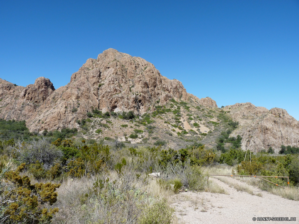 Big Bend National Park Berg Landschaft Fels Aufstieg Steigung Himmel Berge Reisen Wüste Hügel Knoll Park Stein Bereich im freien landschaftlich Wildnis Felsen Klippe nationalen Geologie Spitze Schlucht Hochland Sand Tourismus Land Szenerie im freien Tal Sommer natürliche Wolken Kaktus Tag Sandstein Landschaften Baum Bildung Hügel Urlaub trocken Insel Wahrzeichen Farbe Linie Umgebung Panorama Aushöhlung felsigen geologische formation Wild Abenteuer Pflanze Grat Tourist geologische Fluss Wanderung Gelände Wandern Panorama Vulkan Strauch Gras Steine Wolke karge Entwicklung des ländlichen Touristische Wasser hoch in der Nähe Bereich außerhalb Ziel vascular plant Wärme Straße Sonne Bäume Land Urlaub vulkanische Antike niemand Bewuchs alt Steppe Braun Landschaft Sonnenlicht Reiner woody plant mountain landscape rock ascent slope sky mountains travel desert hill knoll park stone range outdoors scenic wilderness rocks cliff national geology peak canyon highland sand tourism land scenery outdoor valley summer natural clouds cactus day sandstone scenics tree formation hills vacation dry island landmark color line environment panorama erosion rocky geological formation wild adventure plant ridge tourist geological river hike terrain hiking panoramic volcano shrub grass stones cloud barren rural touristic water high near area outside destination vascular plant heat road sun trees country holiday volcanic ancient nobody vegetation old steppe brown countryside sunlight plain woody plant