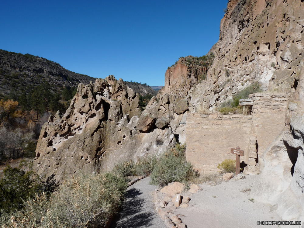 Bandelier National Monument Klippe Schlucht Berg Fels Cliff-Wohnung Landschaft geologische formation Wohnung Himmel Park Stein Reisen Tal Gehäuse Berge Aufstieg Tourismus nationalen Steigung Wüste Felsen Sandstein Schlucht Hügel Struktur Wildnis Sand landschaftlich Urlaub Geologie im freien natürliche Ziel felsigen Sommer im freien Bereich Wahrzeichen Mauer Baum Wandern Bereich hoch Antike Tourist Bildung Fluss Wasser Farbe natürliche depression Wolken Tag Klippen Umgebung Bäume Spitze Panorama Sonne Linie niemand Szenerie Touristische alt Landschaften Panorama Meer Urlaub Ringwall Küste Geschichte Nationalpark Aushöhlung Wanderung reservieren Aussicht Wald Extreme Steine Formationen geologische Grat Ehrfurcht Wild Szene Ruine Wolke Einsamkeit Abenteuer Süden Nach oben Rau ruhige vertikale Höhle cliff canyon mountain rock cliff dwelling landscape geological formation dwelling sky park stone travel valley housing mountains ascent tourism national slope desert rocks sandstone ravine hill structure wilderness sand scenic vacation geology outdoors natural destination rocky summer outdoor range landmark wall tree hiking area high ancient tourist formation river water color natural depression clouds day cliffs environment trees peak panoramic sun line nobody scenery touristic old scenics panorama sea holiday rampart coast history national park erosion hike reserve vista forest extreme stones formations geological ridge awe wild scene ruin cloud solitude adventure south top rough tranquil vertical cave