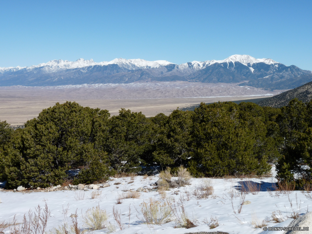 Great Sand Dunes National Park Schnee Berg Winter Landschaft Bereich Berge Eis kalt Wald Bäume Steigung Himmel Wetter Reisen Ski Spitze schneebedeckt Baum Alpine Alp im freien Frost geologische formation Gletscher landschaftlich Einfrieren Wildnis Park Saison gefroren Skipiste Szenerie Hochland Sonne hoch Alpen Fluss im freien Sport Tourismus Urlaub sonnig Wandern Resort abgedeckt majestätisch natürliche Höhe Holz Hügel Skifahren Wolke See Fels Kiefer nationalen Extreme Wolken Tag felsigen Urlaub natürliche Wild Szene Tourist Nach oben Branch Spitzen Aufstieg Wasser Hölzer Bergsteigen Mount eisig Wanderweg klar Neu frostig Klettern Klettern saisonale Tal Kristall Felsen Reise Urlaub Land friedliche Umgebung Tanne Sonnenlicht Entwicklung des ländlichen Land Frühling immergrün Klippe Landschaften Panorama Stein Landschaft Linie snow mountain winter landscape range mountains ice cold forest trees slope sky weather travel ski peak snowy tree alpine alp outdoors frost geological formation glacier scenic freeze wilderness park season frozen ski slope scenery highland sun high alps river outdoor sport tourism vacation sunny hiking resort covered majestic natural elevation wood hill skiing cloud lake rock pine national extreme clouds day rocky holiday natural wild scene tourist top branch peaks ascent water woods mountaineering mount icy trail clear new frosty climb climbing seasonal valley crystal rocks journey vacations land peaceful environment fir sunlight rural country spring evergreen cliff scenics panorama stone countryside line