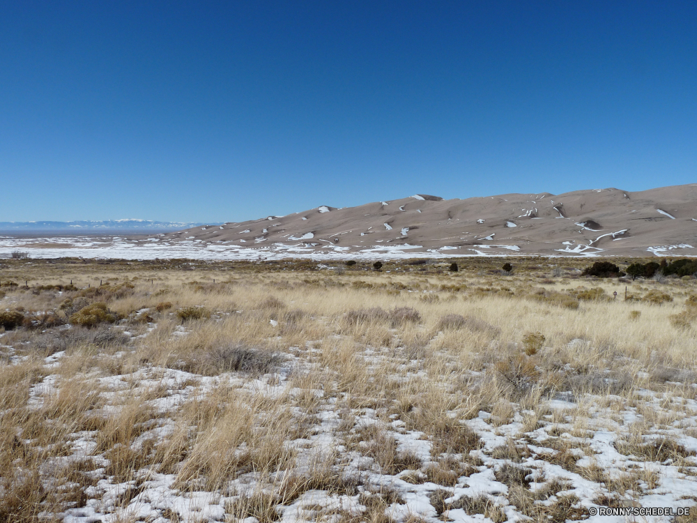 Great Sand Dunes National Park Landschaft Land Reiner Steppe Himmel Sand Reisen Berg Berge Schnee Fels Wüste Hochland Strand im freien Ozean Stein landschaftlich Düne Wasser Tal im freien Felsen Meer Küste Winter Sommer Park Urlaub Wolke Szenerie Baum Tourismus Szene Wildnis trocken Umgebung natürliche Tundra Spitze Wetter Bereich niemand Hügel Küstenlinie Ufer nationalen Wolken Eis sonnig See Insel Erde Klippe ruhige Horizont Fluss Sonne kalt außerhalb Tag Sonnenuntergang schneebedeckt Entwicklung des ländlichen felsigen klar Landschaften hoch Panorama Abenteuer Reise Boden Pflanze Schlucht Becken Dürre Geologie Gelände Hügel Welle Extreme Urlaub Saison Klima Tropischer natürliche depression Küste heiß Landschaft geologische formation Wild Wald Alpine Arid Tod Frost seelandschaft Bucht Frühling Boden Sonnenlicht Bäume landscape land plain steppe sky sand travel mountain mountains snow rock desert highland beach outdoor ocean stone scenic dune water valley outdoors rocks sea coast winter summer park vacation cloud scenery tree tourism scene wilderness dry environment natural tundra peak weather range nobody hill shoreline shore national clouds ice sunny lake island earth cliff tranquil horizon river sun cold outside day sunset snowy rural rocky clear scenics high panorama adventure journey soil plant canyon basin drought geology terrain hills wave extreme holiday season climate tropical natural depression coastline hot countryside geological formation wild forest alpine arid death frost seascape bay spring ground sunlight trees