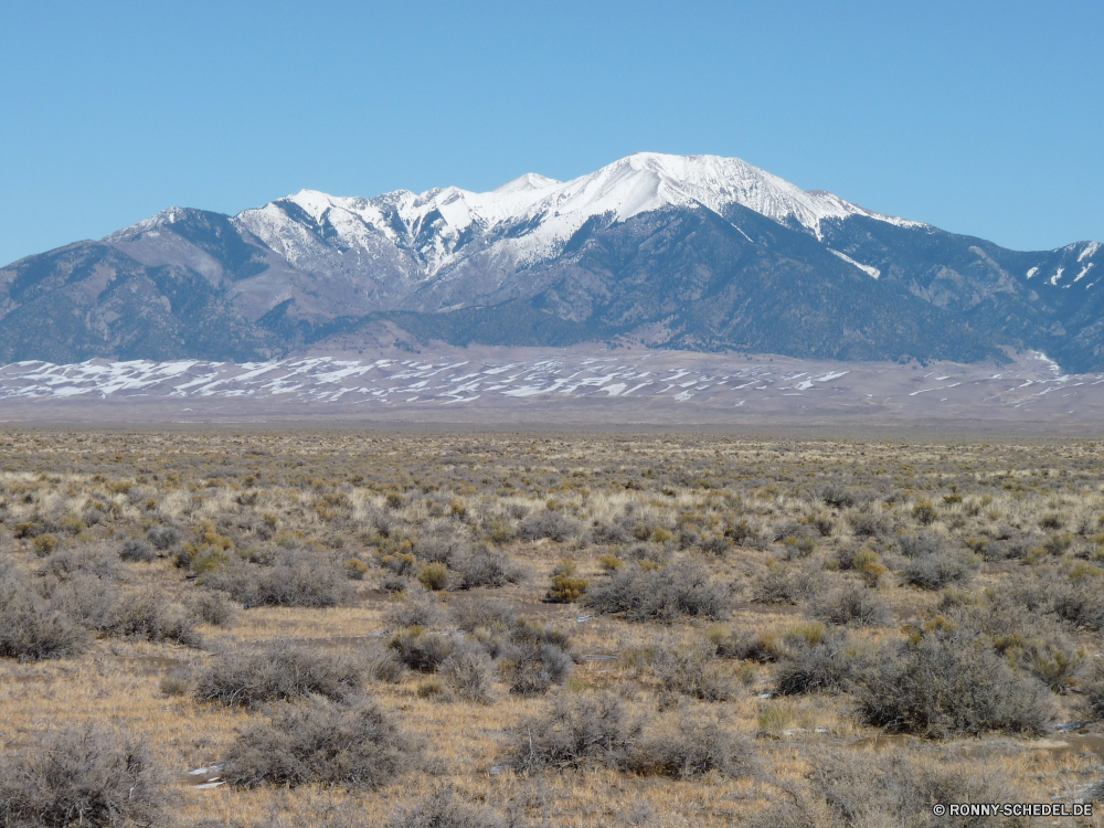 Great Sand Dunes National Park Hochland Berg Landschaft Bereich Berge Schnee Reisen Himmel Spitze Land Tourismus Steppe hoch landschaftlich Reiner Fels Szenerie Baum Gletscher Wildnis Wald Hügel im freien Park Winter Tal Wolken sonnig Alpine Umgebung Eis Stein schneebedeckt nationalen Sommer im freien Wolke kalt Wandern majestätisch Gras Frühling Nach oben Urlaub felsigen Reise Spitzen Klettern natürliche Fluss Mount Klettern Bäume Bergsteigen Alpen Panorama Wasser Wild Wüste Ziel Extreme Szene Feld Tundra Wanderung übergeben See Landschaft Wiese Grat Wandern Ski Entwicklung des ländlichen abgedeckt Steigung Abenteuer Sonnenschein friedliche Horizont Kiefer höchsten Gipfeltreffen Hügel Klippe Erhaltung Stream Pfad Felsen trocken Sonne fallen ruhige Saison highland mountain landscape range mountains snow travel sky peak land tourism steppe high scenic plain rock scenery tree glacier wilderness forest hill outdoors park winter valley clouds sunny alpine environment ice stone snowy national summer outdoor cloud cold hiking majestic grass spring top vacation rocky journey peaks climbing natural river mount climb trees mountaineering alps panorama water wild desert destination extreme scene field tundra hike pass lake countryside meadow ridge trekking ski rural covered slope adventure sunshine peaceful horizon pine highest summit hills cliff conservation stream path rocks dry sun fall tranquil season