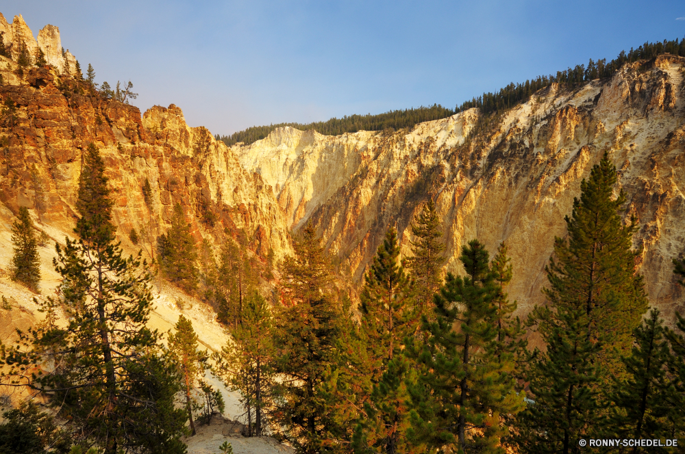 Yellowstone National Park Berg Schlucht Landschaft Baum Berge Tal Wildnis Park nationalen Bereich Himmel Wald Fels Bäume Reisen Klippe Schlucht Fluss Tourismus Stein im freien landschaftlich geologische formation Szenerie Wolke Herbst Urlaub Hügel Sommer Wolken fallen Hochland Wasser Schnee See im freien Wüste woody plant Wandern Spitze natürliche depression Felsen Gras hoch natürliche Umgebung vascular plant Hügel Kiefer Hölzer Abenteuer sonnig Frühling bunte Aushöhlung Geologie Grand felsigen Belaubung Pflanze Orange Tourist Straße Wild Norden Szene Ziel Wahrzeichen Alp Land Tag Busch Panorama Saison Winter friedliche Land gelb Mount Bildung Farbe Aussicht Stream Nach oben Sonne Ruhe Gletscher Tanne am Morgen Farben Blätter mountain canyon landscape tree mountains valley wilderness park national range sky forest rock trees travel cliff ravine river tourism stone outdoors scenic geological formation scenery cloud autumn vacation hill summer clouds fall highland water snow lake outdoor desert woody plant hiking peak natural depression rocks grass high natural environment vascular plant hills pine woods adventure sunny spring colorful erosion geology grand rocky foliage plant orange tourist road wild north scene destination landmark alp country day bush panorama season winter peaceful land yellow mount formation color vista stream top sun calm glacier fir morning colors leaves