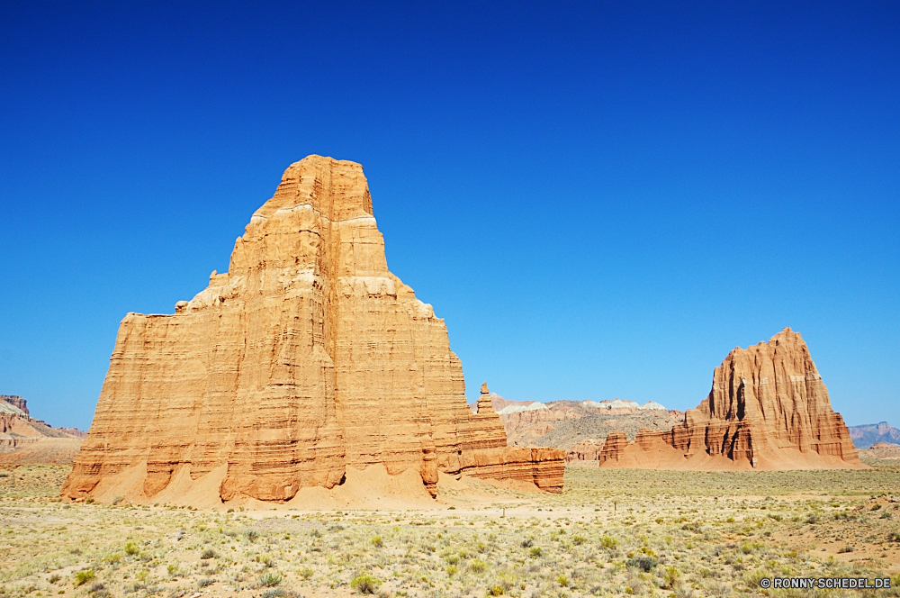 Capitol Reef National Park - Cathedral Valley Pyramide Grab Stein Wüste Reisen Antike Fels Geschichte Sand Tourismus Himmel Landschaft Lineal alt Denkmal Wahrzeichen Architektur Sandstein berühmte Gebäude Ruine Berg Schlucht Park Backstein Tourist Tempel Turm historischen Kultur Platz Archäologie Klippe nationalen im freien historische landschaftlich Vergangenheit Festung Urlaub Wolken Grab Mauer Schloss Wildnis Pharao im freien Zivilisation Ruine Tal groß Baumaterial Hügel Osten Formationen Ehrfurcht Bögen Festung natürliche Felsen Szenerie Bildung Geologie Mysterium Skulptur Statue Steine Orange Sphinx Sonnenuntergang Butte Südwesten Sommer Ziel Land Stadt Kunst Aushöhlung Panorama Attraktion Reise Stadt Berge Mesa Befestigung geologische Erbe majestätisch mittelalterliche traditionelle Form trocken Farbe Welt Entwicklung des ländlichen pyramid grave stone desert travel ancient rock history sand tourism sky landscape ruler old monument landmark architecture sandstone famous building ruin mountain canyon park brick tourist temple tower historic culture place archeology cliff national outdoors historical scenic past fortress vacation clouds tomb wall castle wilderness pharaoh outdoor civilization ruins valley great building material hill east formations awe arches fort natural rocks scenery formation geology mystery sculpture statue stones orange sphinx sunset butte southwest summer destination land city art erosion panoramic attraction journey town mountains mesa fortification geological heritage majestic medieval traditional shape dry color world rural