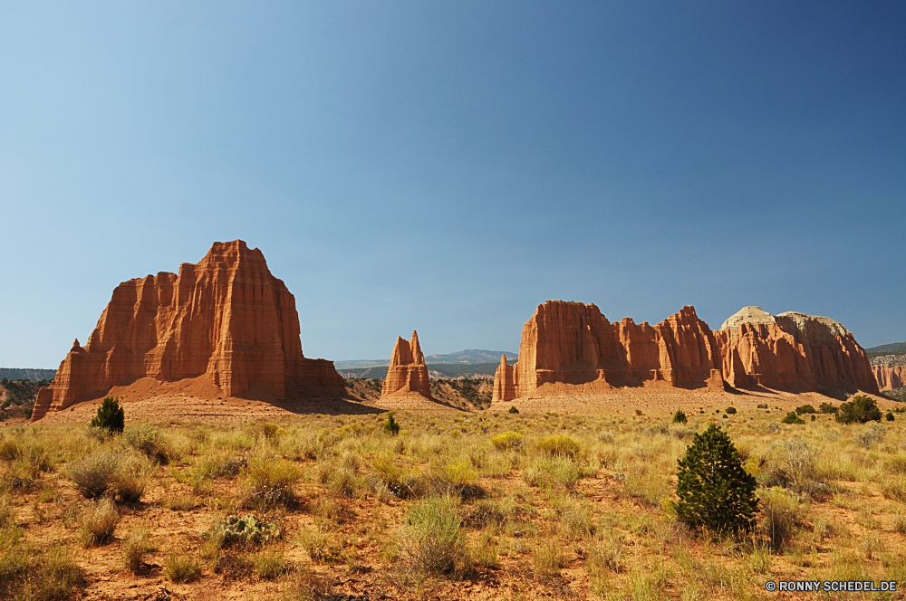 Capitol Reef National Park - Cathedral Valley Schloss Befestigung Defensive Struktur Landschaft Struktur Fels Reisen Wüste Park Himmel Berg Stein nationalen Festung Tourismus Schlucht Palast Sandstein im freien natürliche Tal Südwesten Wolken Felsen Denkmal landschaftlich im freien alt Geschichte Berge Urlaub Klippe Antike Wahrzeichen Bögen Aushöhlung Formationen Sand Mauer Geologie Turm Orange Bildung Ruine Westen Panorama Wildnis Hügel Land Gebäude historischen Mesa geologische Ehrfurcht Landschaften Land Architektur Szenerie Baum Wandern Entwicklung des ländlichen mittelalterliche Kaktus Tourist friedliche ruhige Butte Ruine Grand westliche Pflanze Steine Tag Sommer Sonnenuntergang Bäume Bogen Spitze Szene Wolke Kultur Haus historische Horizont Megalith gelb Herbst Felsenburg Festung Aussicht Hügel Heu Panorama Abenteuer Süden berühmte bunte castle fortification defensive structure landscape structure rock travel desert park sky mountain stone national fortress tourism canyon palace sandstone outdoors natural valley southwest clouds rocks monument scenic outdoor old history mountains vacation cliff ancient landmark arches erosion formations sand wall geology tower orange formation ruins west panoramic wilderness hill land building historic mesa geological awe scenics country architecture scenery tree hiking rural medieval cactus tourist peaceful tranquil butte ruin grand western plant stones day summer sunset trees arch peak scene cloud culture house historical horizon megalith yellow autumn stronghold fort vista hills hay panorama adventure south famous colorful