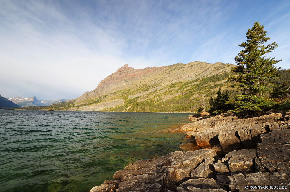 Glacier National Park geologische formation Vorgebirge Landschaft Klippe Meer Wasser natürliche Höhe Küste Berg Ozean Fels Reisen Küste Berge landschaftlich Himmel Strand Hügel Kap Ufer Hochland Felsen Fluss Baum Sommer Urlaub Szenerie Tourismus Park Stein See Insel im freien Wildnis Szene Panorama Wolke Wald Wolken Sonne Küstenlinie felsigen Sand Bäume im freien Tag Urlaub Bucht Tal nationalen Wetter Horizont sonnig Wellen Klippen Hügel Bereich Spitze am Meer Steine hoch Welle Umgebung Küste Herbst Wandern Panorama natürliche ruhige Straße Farbe seelandschaft Ziel Reflexion Gras malerische Norden Landschaften Paradies Süden Stadt Urlaub Tourist Sonnenuntergang Frühling Pflanze Saison klar geological formation promontory landscape cliff sea water natural elevation coast mountain ocean rock travel coastline mountains scenic sky beach hill cape shore highland rocks river tree summer vacation scenery tourism park stone lake island outdoor wilderness scene panorama cloud forest clouds sun shoreline rocky sand trees outdoors day holiday bay valley national weather horizon sunny waves cliffs hills range peak seaside stones high wave environment coastal autumn hiking panoramic natural tranquil road color seascape destination reflection grass picturesque north scenics paradise south city holidays tourist sunset spring plant season clear