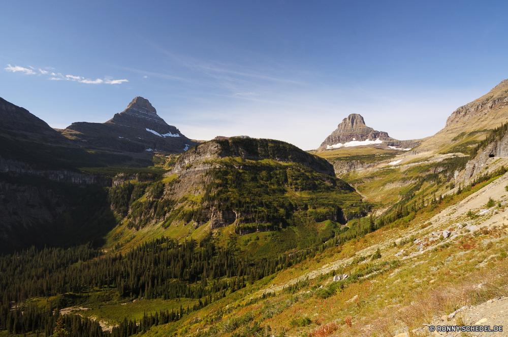 Glacier National Park Berg Hochland Landschaft Berge Bereich Himmel Reisen Tal Baum Wildnis Wald im freien Sommer Park Knoll Szenerie Tourismus Gras Spitze Wolken Hügel landschaftlich Fels Steigung Bäume Entwicklung des ländlichen Frühling Wolke im freien Landschaft felsigen nationalen Wandern Aufstieg Herbst friedliche Wiese Stein natürliche Wasser Fluss Wild Umgebung Pflanze majestätisch Panorama Klippe Land Abenteuer hoch See Ruhe Feld Straße Grat Alpine Land Szene Tourist Tag Horizont Schnee Urlaub Linie Landschaften Schlucht Saison ruhige Urlaub außerhalb gelassene idyllische geologische formation Pflanzen Vulkan Ökologie fallen Wahrzeichen Licht Alp bunte Landschaften Wanderung Antike Hügel sonnig Reise Süden Sonne Insel natürliche Höhe Reflexion gelb mountain highland landscape mountains range sky travel valley tree wilderness forest outdoors summer park knoll scenery tourism grass peak clouds hill scenic rock slope trees rural spring cloud outdoor countryside rocky national hiking ascent autumn peaceful meadow stone natural water river wild environment plant majestic panorama cliff country adventure high lake calm field road ridge alpine land scene tourist day horizon snow vacation line scenics canyon season tranquil holiday outside serene idyllic geological formation plants volcano ecology fall landmark light alp colorful landscapes hike ancient hills sunny trip south sun island natural elevation reflection yellow