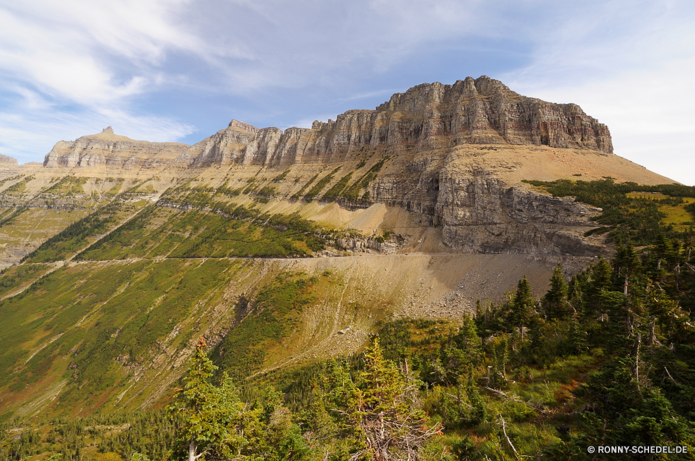 Glacier National Park Berg Berge Landschaft Hochland Bereich Wildnis Tal Reisen Himmel Wald Tourismus Park nationalen Fels Gras Sommer Szenerie Spitze Fluss Baum Hügel Schnee Wasser im freien Wolken Alp Wolke landschaftlich See hoch Bäume Stein Umgebung geologische formation Panorama Aufstieg im freien Frühling Hügel Wiese Steigung Wüste Schlucht Urlaub Szene felsigen natürliche Höhe Entwicklung des ländlichen Felsen Herbst Reflexion Spitzen Alpine natürliche Landschaft fallen Straße Busch friedliche Alpen übergeben Wandern Gletscher sonnig Tag Kiefer Ruhe Klippe Land Land Bereich Becken Feld Tourist Horizont Grat Mount Linie Wild Pflanze gelb außerhalb gelassene Ziel Farbe Schlucht Licht natürliche depression Urlaub steilen Landschaften Pfad Urlaub Belaubung Wahrzeichen Saison mountain mountains landscape highland range wilderness valley travel sky forest tourism park national rock grass summer scenery peak river tree hill snow water outdoors clouds alp cloud scenic lake high trees stone environment geological formation panorama ascent outdoor spring hills meadow slope desert canyon vacation scene rocky natural elevation rural rocks autumn reflection peaks alpine natural countryside fall road bush peaceful alps pass hiking glacier sunny day pine calm cliff land country area basin field tourist horizon ridge mount line wild plant yellow outside serene destination color ravine light natural depression holiday steep scenics path vacations foliage landmark season