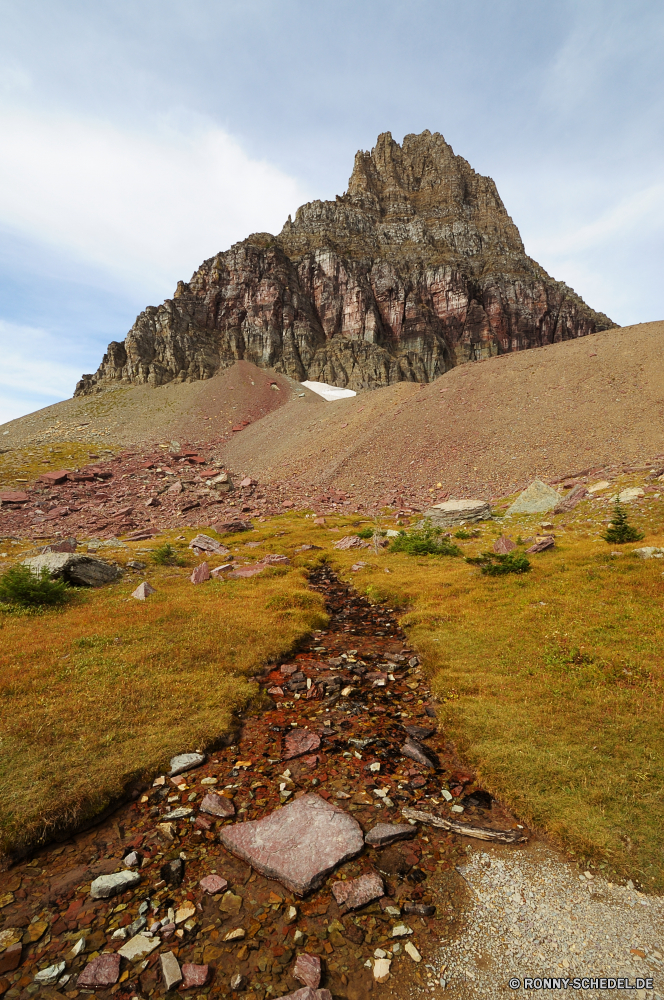 Glacier National Park Berg Landschaft Grab Reisen Himmel Stroh Knoll Hochland Berge Tourismus Fels Hügel Stein Dach landschaftlich Spitze Antike Wüste im freien Steigung Wolken Geschichte im freien Pyramide Sommer Schutzüberzug Tourist Felsen Aufstieg Urlaub Wahrzeichen Szenerie Wildnis Tal Architektur Park Ziel Wolke nationalen geologische formation alt Baum natürliche Höhe Alp Klippe Urlaub Denkmal Bereich Sonne Pharao Bespannung Linie groß Sand Gras Vulkan felsigen Landschaften Osten Land Schlucht Grab majestätisch Wandern Wild Wald Panorama hoch Szene Steine Tag Kultur berühmte Bäume vulkanische Landschaften Ruine Geologie Licht Bau Abenteuer Pflanzen Umgebung Grat Archäologie Wunder Klettern Bildung Pflanze natürliche Insel Kunst Schnee Fluss Entwicklung des ländlichen Meer mountain landscape grave travel sky thatch knoll highland mountains tourism rock hill stone roof scenic peak ancient desert outdoors slope clouds history outdoor pyramid summer protective covering tourist rocks ascent vacation landmark scenery wilderness valley architecture park destination cloud national geological formation old tree natural elevation alp cliff holiday monument range sun pharaoh covering line great sand grass volcano rocky scenics east land canyon tomb majestic hiking wild forest panorama high scene stones day culture famous trees volcanic landscapes ruins geology light construction adventure plants environment ridge archeology wonder climbing formation plant natural island art snow river rural sea