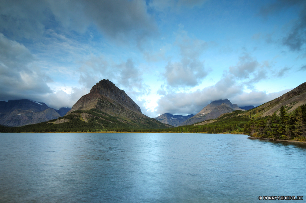 Glacier National Park See Berg Landschaft Wasser Bereich Berge Himmel Ufer Reisen am See Tourismus Wolken Körper des Wassers Meer Fluss Reflexion Baum Sommer Spitze Szenerie Ozean Wald geologische formation Park Schnee im freien Ruhe Fels Küste natürliche Höhe Szene nationalen Wolke landschaftlich klar sonnig Wildnis Boot Kap Vulkan Insel ruhige Bäume Hügel Umgebung Panorama Felsen Strand im freien Stein Becken natürliche Küste Hochland Horizont Tag Landschaften Klippe Sonne Wandern Bucht Urlaub Sonnenuntergang Vorgebirge felsigen Teich Herbst natürliche depression Gletscher horizontale Mount gelassene friedliche Gras Bereich Wetter Land Urlaub hoch entfernten Norden Spiegel idyllische Urlaub Haus bewölkt reine Nach oben Farbe Sonnenlicht Sand lake mountain landscape water range mountains sky shore travel lakeside tourism clouds body of water sea river reflection tree summer peak scenery ocean forest geological formation park snow outdoors calm rock coast natural elevation scene national cloud scenic clear sunny wilderness boat cape volcano island tranquil trees hill environment panorama rocks beach outdoor stone basin natural coastline highland horizon day scenics cliff sun hiking bay vacation sunset promontory rocky pond autumn natural depression glacier horizontal mount serene peaceful grass area weather land holiday high remote north mirror idyllic vacations house cloudy pure top color sunlight sand