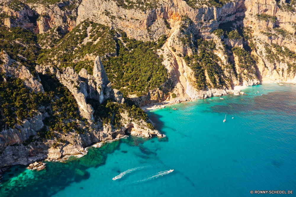 Cala Goloritzé Strand Meer Wasser Landschaft Küste Ozean Reisen Bucht Insel Himmel Sommer Sand Fels Küste Urlaub Ufer Baum Berg Klippe landschaftlich Sonne Tourismus geologische formation Urlaub See im freien Felsen Park Tropischer sonnig Paradies Welle Fluss Wolke Land Stein Tourist Vorgebirge Boot im freien Wellen Archipel Szenerie natürliche Höhe Szene Wald Ziel natürliche felsigen seelandschaft Berge Schlucht Körper des Wassers Wolken Surf Küstenlinie Lagune ruhige Küste Erholung natürliche depression idyllische Urlaub warm Entspannen Sie sich Kiefer klar Hügel Palm Türkis Wild Becken am Meer Entspannung nationalen Kap Pazifik Panorama Süden Pflanze Stadt Tal Reflexion Horizont Sonnenlicht Bäume Resort Nautik Steine Stream Freizeit friedliche Ruhe Tag Segeln Reise Schlucht Frühling romantische beach sea water landscape coast ocean travel bay island sky summer sand rock coastline vacation shore tree mountain cliff scenic sun tourism geological formation holiday lake outdoor rocks park tropical sunny paradise wave river cloud land stone tourist promontory boat outdoors waves archipelago scenery natural elevation scene forest destination natural rocky seascape mountains canyon body of water clouds surf shoreline lagoon tranquil coastal recreation natural depression idyllic vacations warm relax pine clear hill palm turquoise wild basin seaside relaxation national cape pacific panorama south plant city valley reflection horizon sunlight trees resort nautical stones stream leisure peaceful calm day sailing trip ravine spring romantic