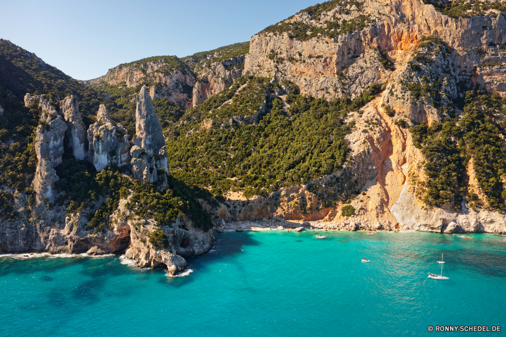 Cala Goloritzé Klippe geologische formation Landschaft Meer Wasser Ozean Strand Küste Reisen Fels Insel Bucht Küste Tourismus Berg Himmel Vorgebirge Urlaub Ufer Sommer Schlucht natürliche Höhe Sand Höhle Sonne landschaftlich Stein seelandschaft Türkis Welle Paradies Felsen Ziel ruhige Urlaub Archipel Tropischer im freien Tourist Sonnenlicht klar Hügel im freien felsigen Szene Reise Schlucht Lagune Resort Wolke sonnig Szenerie Horizont Boot Tag Land Baum See idyllische Urlaub Wellen natürliche Tal Fluss Entspannen Sie sich Park Wolken exotische Surf Berge Pazifik Wild hoch natürliche depression Klippen Schwimmen am Meer Süden Umgebung Küstenlinie Sonnenuntergang Inseln Nautik Körper des Wassers Reiseziele Abenteuer Entspannung friedliche Wahrzeichen Erholung Küste Kap Urlaub cliff geological formation landscape sea water ocean beach coast travel rock island bay coastline tourism mountain sky promontory vacation shore summer canyon natural elevation sand cave sun scenic stone seascape turquoise wave paradise rocks destination tranquil holiday archipelago tropical outdoors tourist sunlight clear hill outdoor rocky scene journey ravine lagoon resort cloud sunny scenery horizon boat day land tree lake idyllic vacations waves natural valley river relax park clouds exotic surf mountains pacific wild high natural depression cliffs swim seaside south environment shoreline sunset islands nautical body of water destinations adventure relaxation peaceful landmark recreation coastal cape holidays